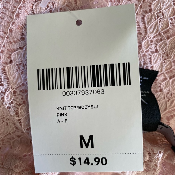 Baby pink with lace size medium soft body suit. - Picture 2 of 2